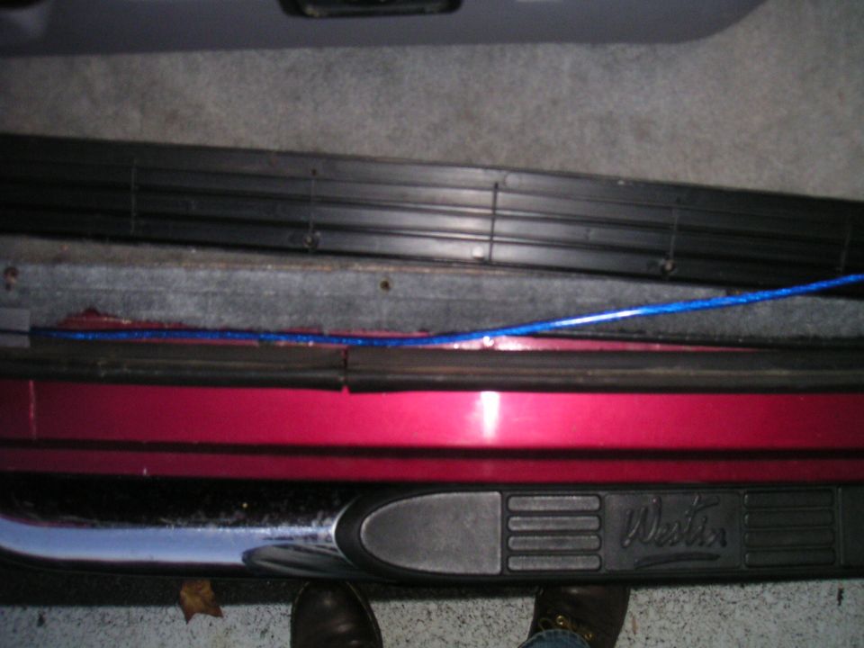 Running board with "Westin" logo on a 1994 Ford Bronco