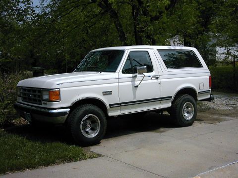 1987 Ford Bronco - This 1987 Ford Bronco is shown from a three-quarter front view, parked outdoors.