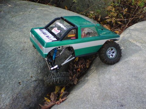 1996 Ford Bronco - This remote-controlled rock crawler navigates a rocky terrain, its off-road capabilities.