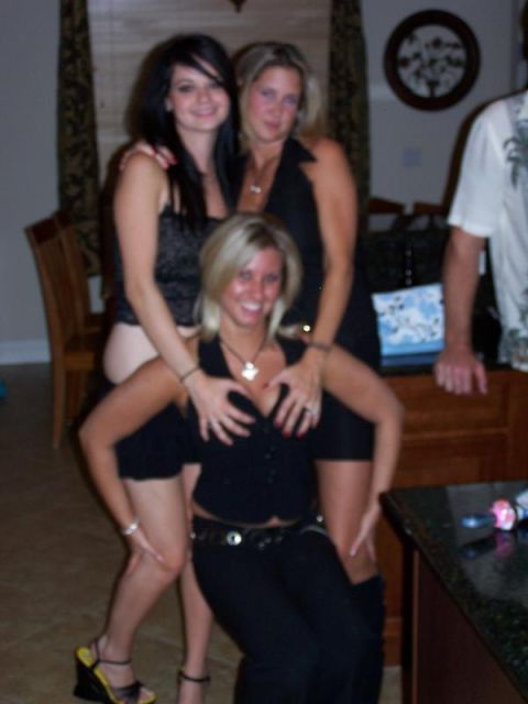 1991 Ford Bronco - Three women posing for a photo indoors.