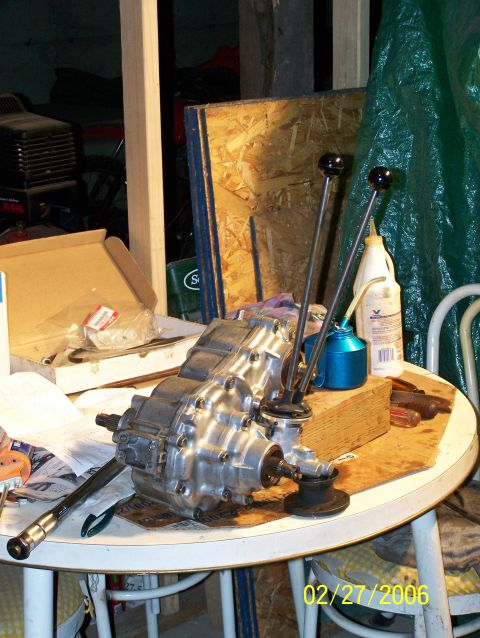 1988 Suzuki Samurai - A transfer case with twin sticks is shown on a table, likely for a vehicle modification or repair.