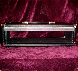 1995 Ford Bronco - This is a black amplifier head cabinet with a metal handle and corner protectors.