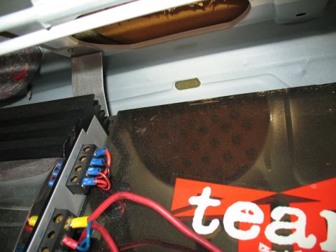 1997 Ford Crown Victoria - This image shows a close-up view of electrical wiring and connectors inside a vehicle's interior.