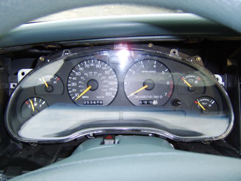 1996 Mercury Grand Marquis - Stang cluster sitting in the stock opening, after being cut down Not mounted in any fashion, working on brackets