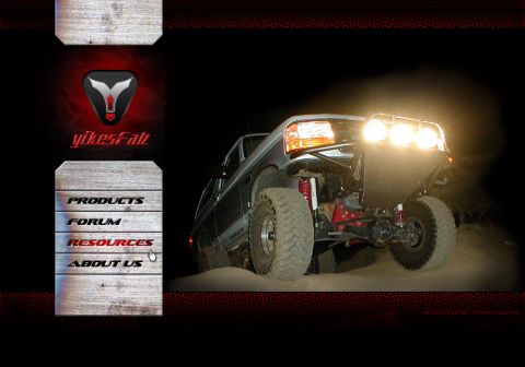1996 Ford Bronco - A modified 1996 Ford Bronco is shown at night with its off-road lights illuminated.
