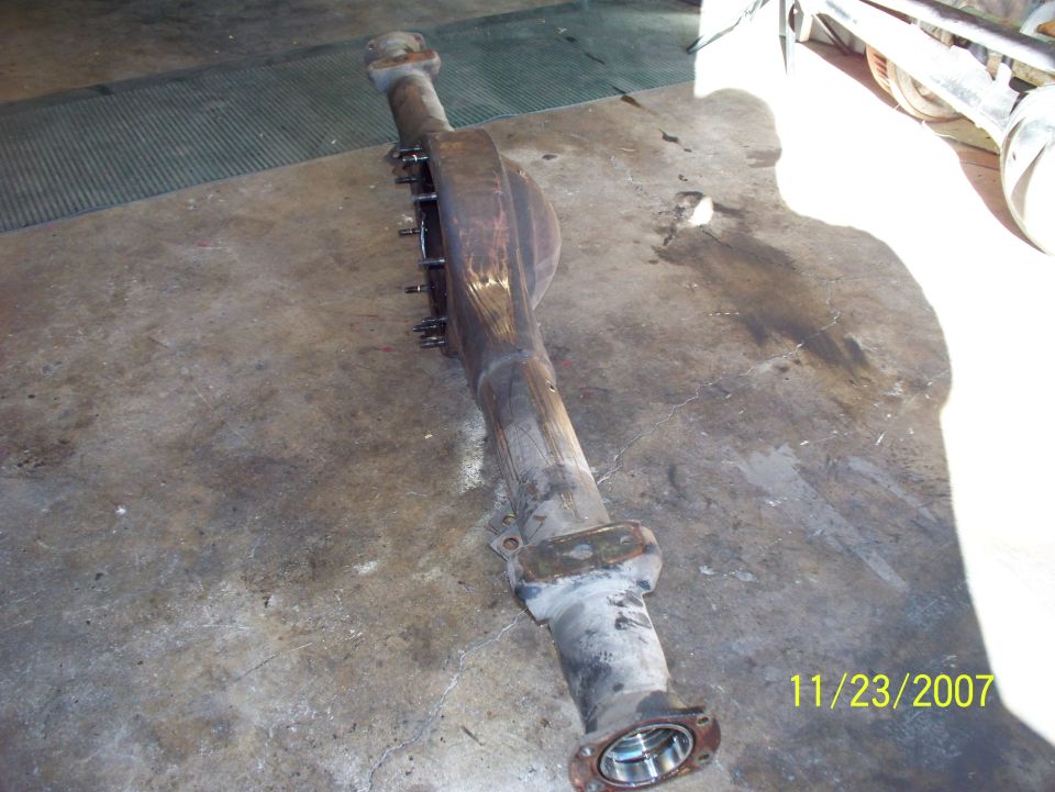 rear axle assembly on concrete floor, date stamp 11/23/2007