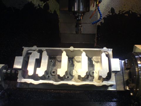 1964 Ford 427 - Machining an engine cylinder head on a CNC mill.