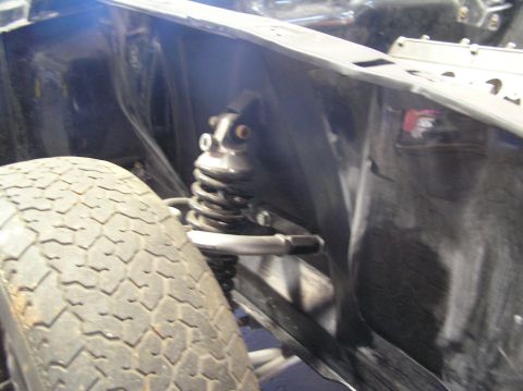 1964 Ford 427 - This photo shows a car's shock absorber and tire, not a specific vehicle model.