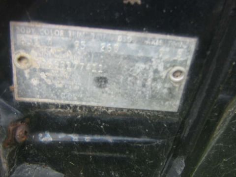 1963 Ford Galaxie - A close-up view of a vehicle's identification plate, showing various codes and numbers.