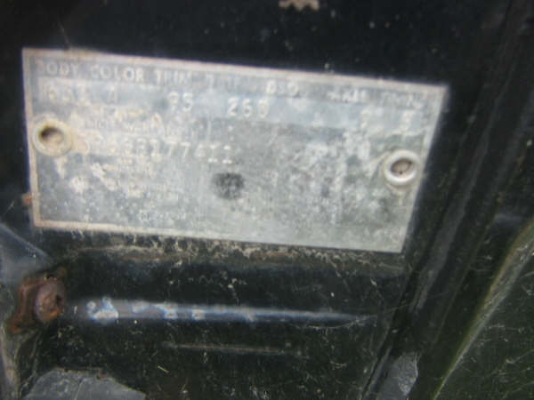 Weathered Ford body data plate with faded body, color, trim, DSO, axle and trans codes