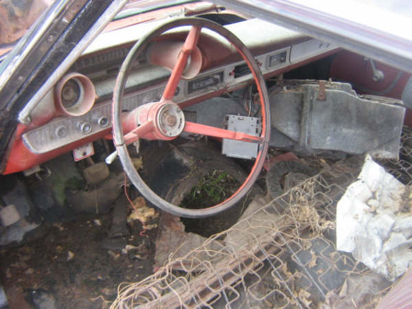 1963 Ford Galaxie interior showing dashboard, steering wheel, and passenger side
