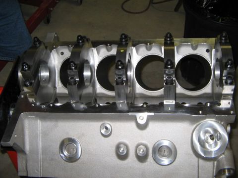 1965 Shelby Cobra - Close-up of an engine block's crankshaft bearing saddles and connecting rod journals.