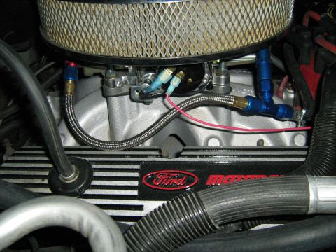 1988 Mercury Grand Marquis - Engine components, including a Ford branded valve cover, are visible in this close-up shot.