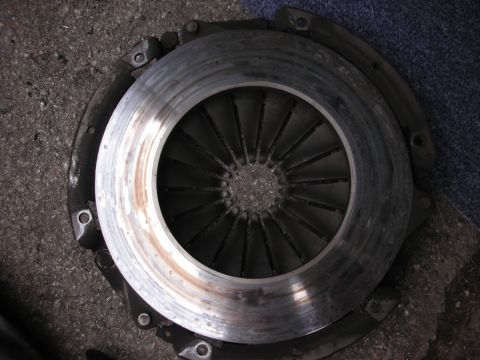 1990 Ford Mustang - A clutch assembly, likely from a manual transmission vehicle, is shown from a top-down perspective.
