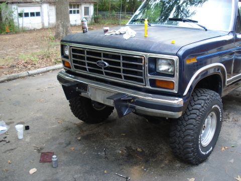 1984 Ford Bronco - Front end of a Ford truck, likely from the early 1980s, with off-road tires.