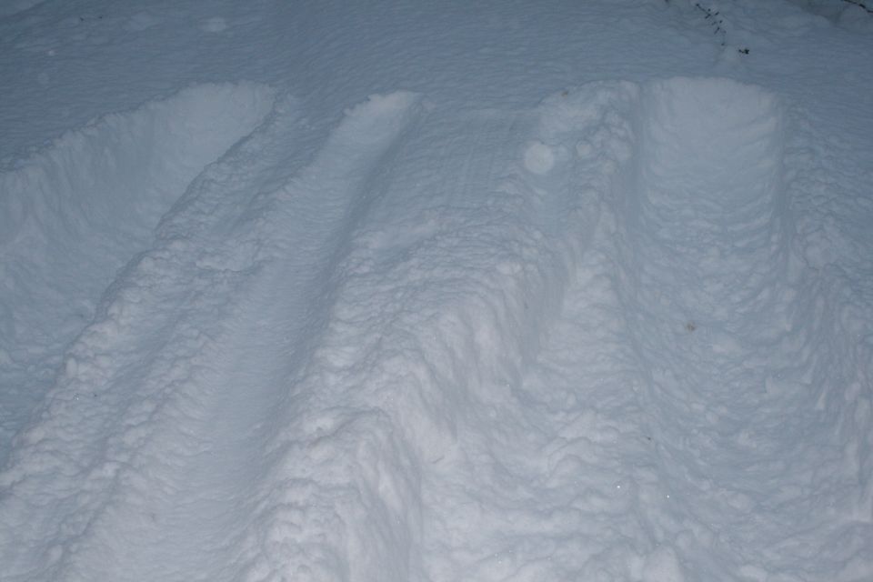 Tire tracks in deep snow