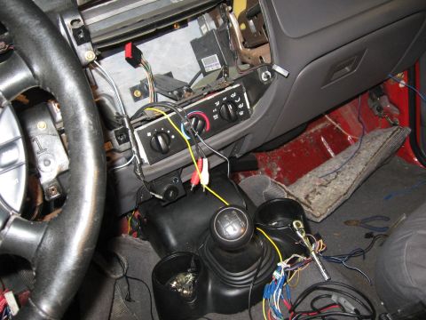 2000 Ford Ranger - Interior view of a 2000 Ford Ranger with dashboard components removed for wiring work.