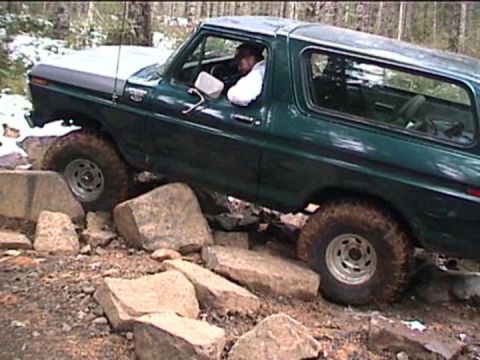 1979 Ford Bronco - This 1978 Ford Bronco is shown off-roading on a challenging rocky terrain.