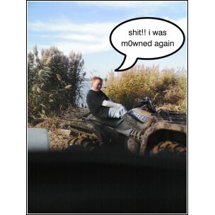 1995 Dodge 1500 - A person is stuck in the mud on an all-terrain vehicle, with a speech bubble saying 'shit! i was m0wned again'.