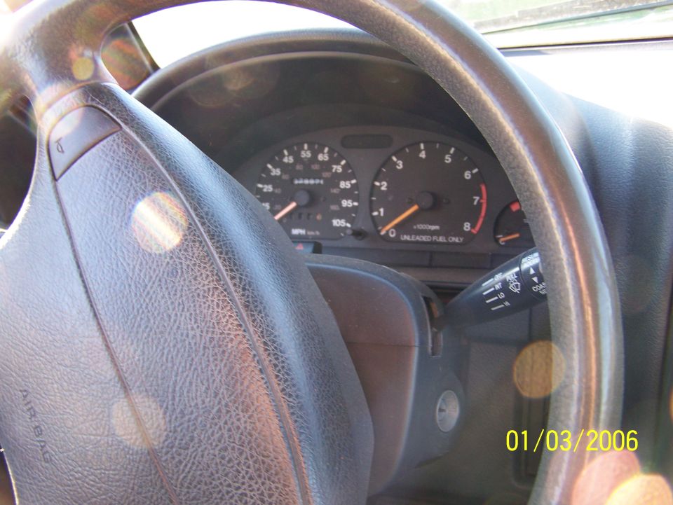 1988 Suzuki Samurai interior showing dashboard, steering wheel, and gauges