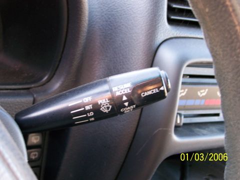 1988 Suzuki Samurai - Interior view of a vehicle's wiper stalk and dashboard vents, with visible control markings.