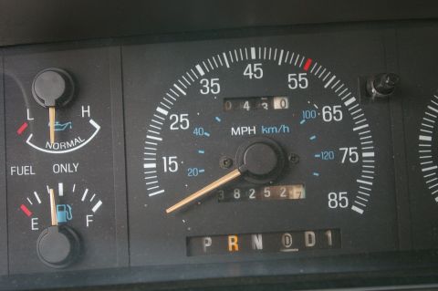 1986 Ford Bronco - Dashboard view of a 1986 Ford Bronco, the speedometer and fuel gauge.