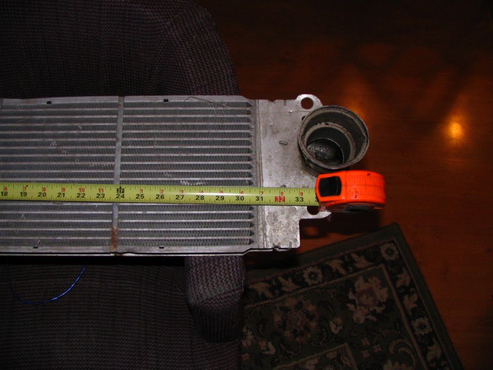 radiator with tape measure showing about 32 inches