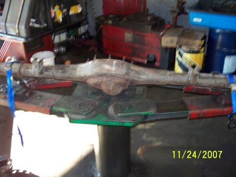 2007 Ford Ranger - A rear axle assembly is shown on a stand in a workshop, with a date stamp of 11/24/2007 visible.
