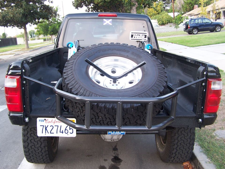 2007 Ford Ranger rear view with spare tire mounted in bed