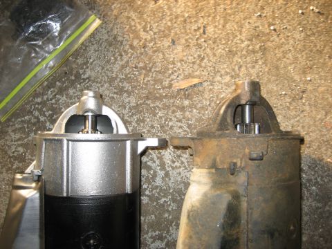 1990 Ford Bronco - Comparison of a new and old starter motor, showing the difference in condition and appearance.
