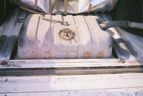 1991 Ford Bronco - The fuel tank is visible, likely removed for maintenance or replacement.