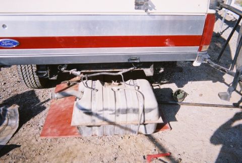 1991 Ford Bronco - The fuel tank has been removed from the underside of the vehicle fording vehicle.
