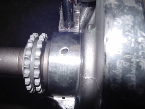 1979 Ford Bronco - Close-up of an engine crankshaft and timing gear, likely from a rebuild project.