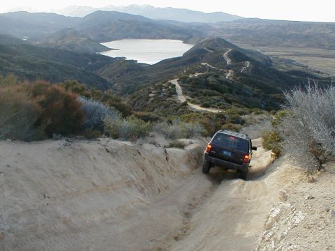 1996 Ford Bronco - Off-roading adventure on a scenic trail with a Jeep Grand Cherokee.