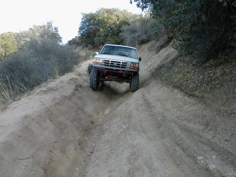 1996 Ford Bronco - This 1996 Ford Bronco navigates a challenging off-road trail, its capabilities.