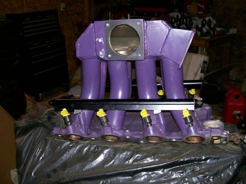 1988 Ford Bronco - Mounted on the custom intake. Those are old injectors, I planning on 39 pounders.