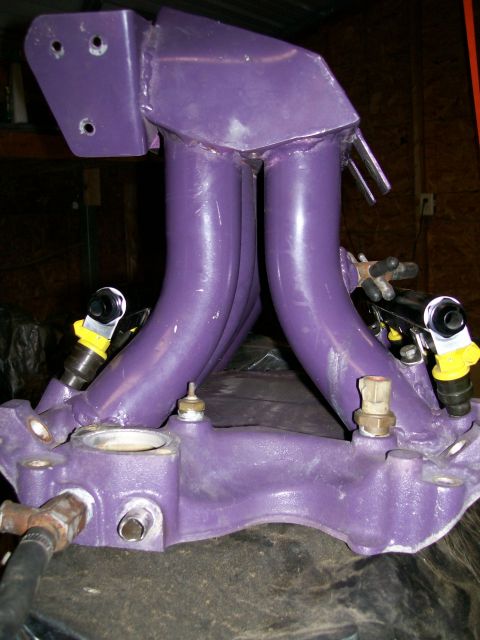 1988 Ford Bronco - Custom painted intake manifold with fuel injectors, likely for an engine rebuild or modification.