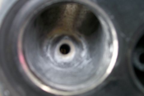 1988 Ford Bronco - This is a close-up view of a cylinder head port, likely showing a valve seat.