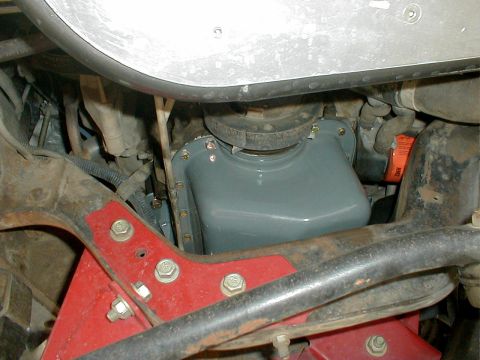 1996 Ford Bronco - Close-up view of the undercarriage, showing the oil pan and oil filter assembly.