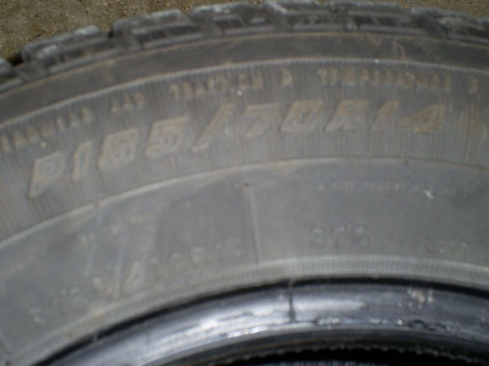 Tire with P185/70R14 markings