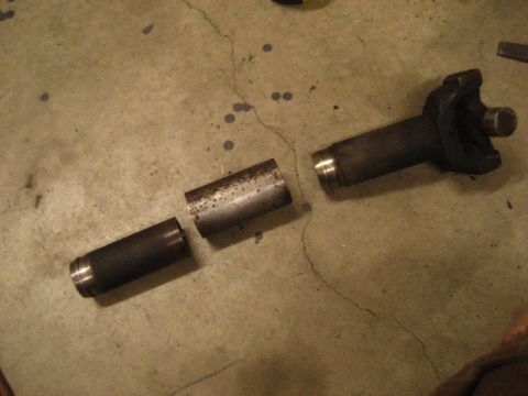 1989 Ford Bronco - the yokes have a 1.75" OD, found a piece of 2" .120 wall to serve as a sleeve to join the two slips together.