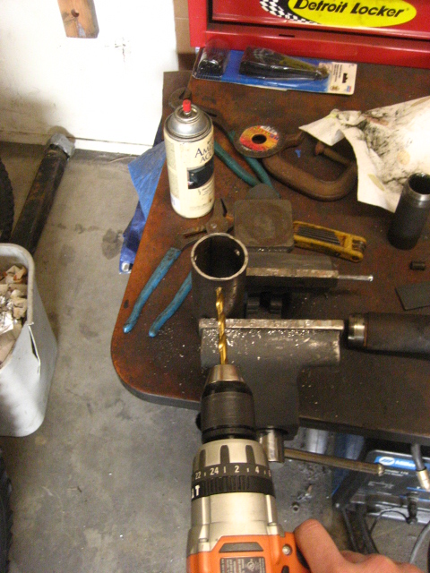 1989 Ford Bronco - drilling the sleeve tube for plug welds. 3x3/8" for each side.