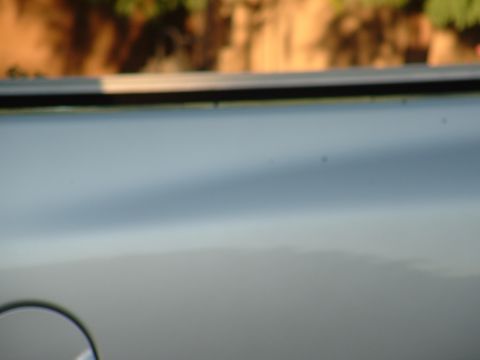 2007 Kawasaki Ninja - A portion of a motorcycle's body panel is visible in this close-up shot.