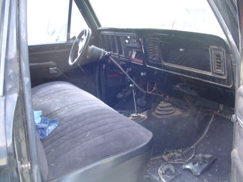 1978 Ford Bronco - Interior view of a 1978 Ford Bronco, a bench seat and dashboard.