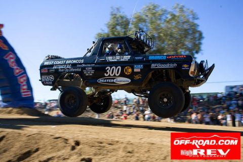 1996 Ford Bronco - This heavily modified Ford Bronco is mid-air during an off-road race event.
