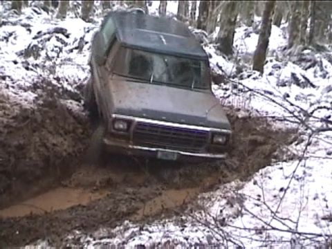 1979 Ford Bronco - This 1978 Ford Bronco is stuck in a muddy ditch during winter conditions.