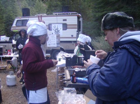 1986 Ford Bronco - Outdoor cooking event with an RV in the background.
