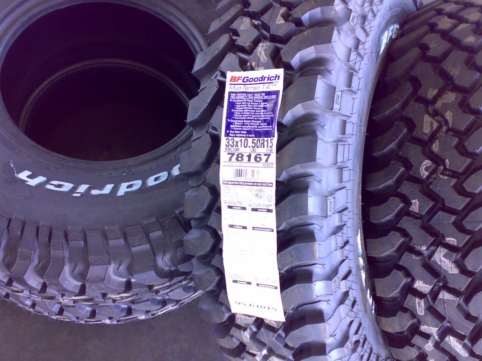 New BFGoodrich Mud-Terrain T/A KM tires, 33x10.50R15, with paper spec label