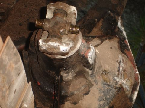 1989 Ford Bronco - Close-up of a driveshaft universal joint, showing wear and tear.