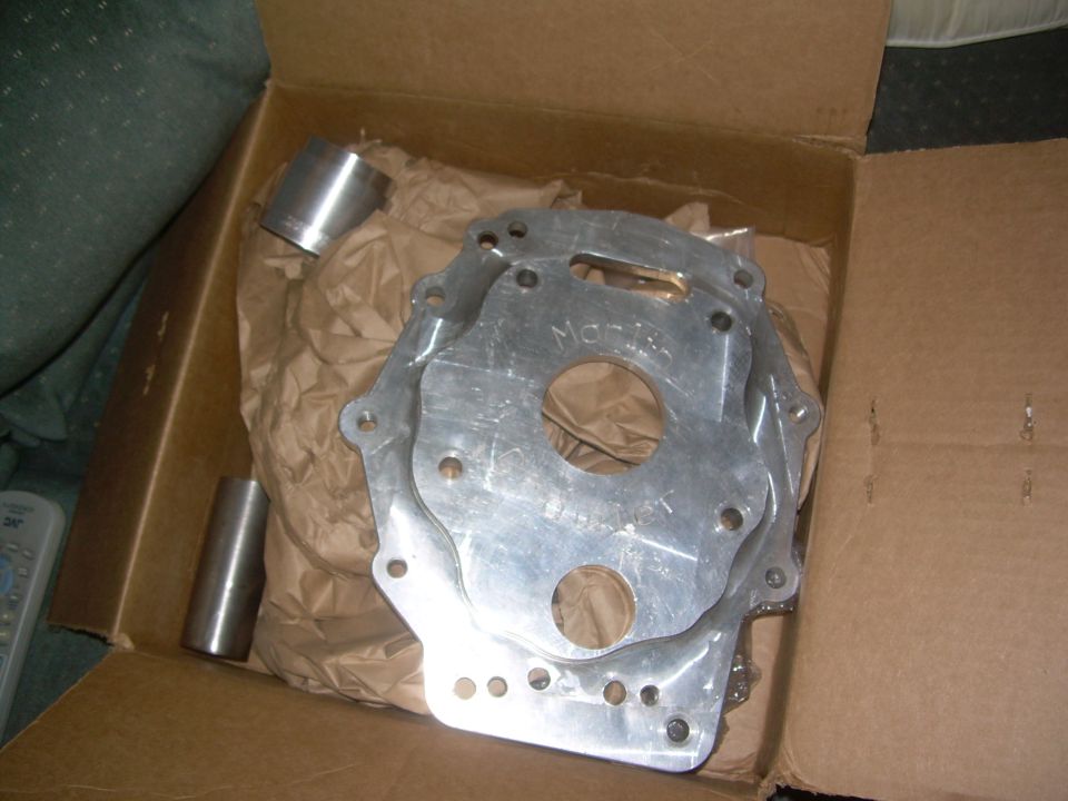 Dual transfer case adapter plate in a box
